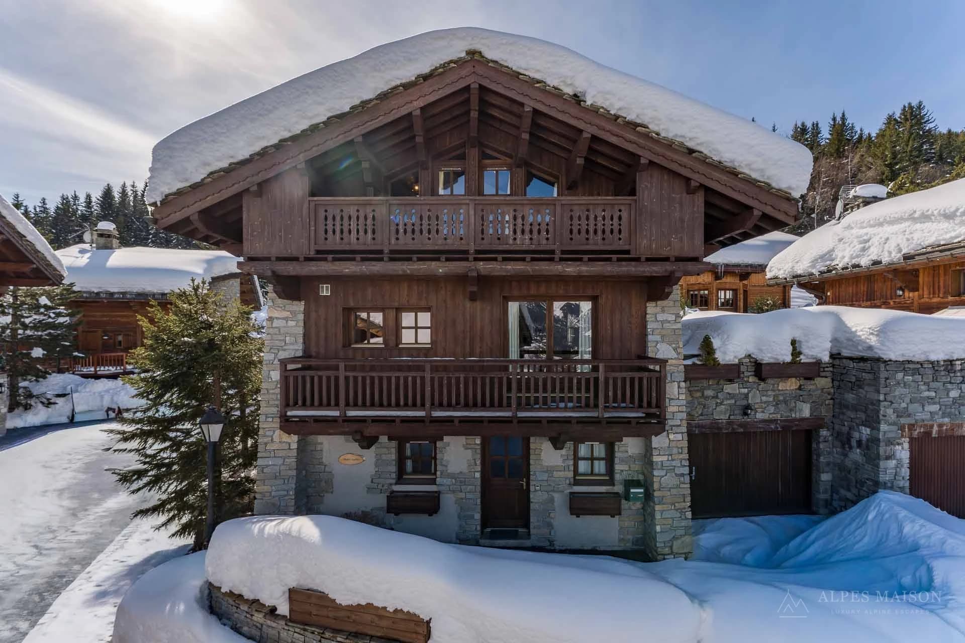 Snow-covered chalet exterior — Three Valleys Escape